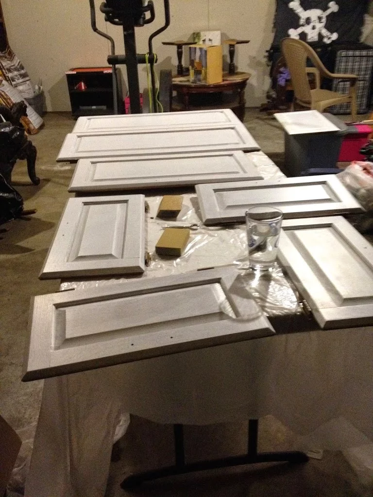 First coat of primer on cabinet doors