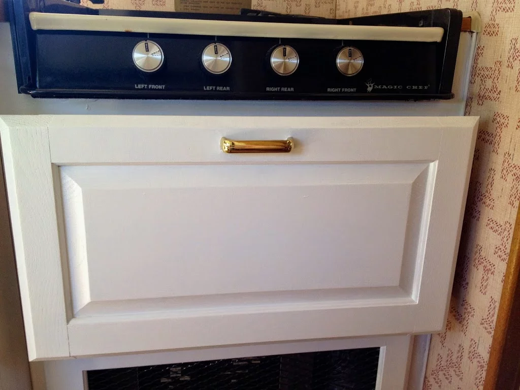 RV Painted white cabinet with gold handle