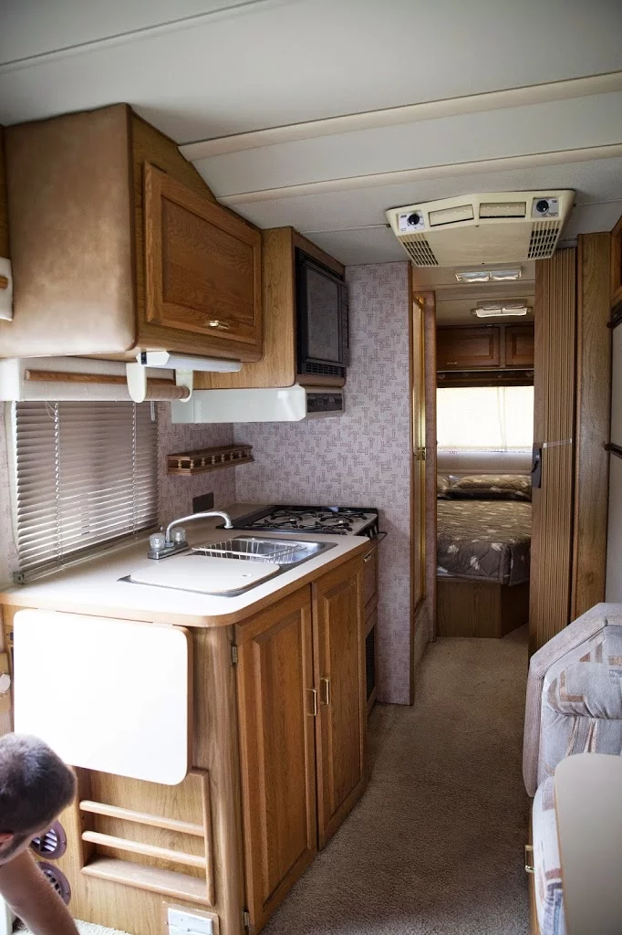 picture of RV camper kitchen and bedroom