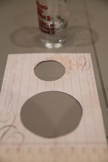 DIY scrapbooking paper with two cut holes 