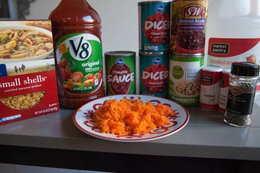 V8 juice, can of tomato sauce, two can of diced tomatoes, can of kidney beans, beans, distilled water, salt and pepper