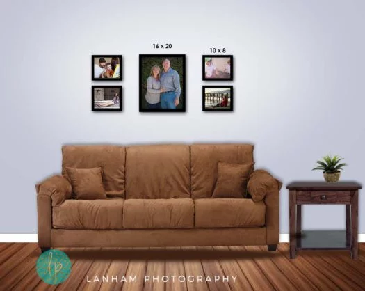 Wall Gallery with five family pictures on the wall, a brown couch, a side table with a plant on it, and a wood floor