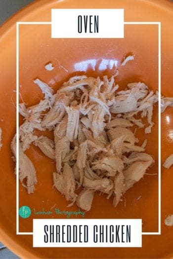Oven Shredded Chicken in orange bowel picture by lanham photography 