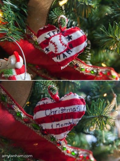 hand made heart Christmas ornament hanging on Christmas tree