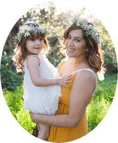 picture of Erika and toddler wearing white flower crowns