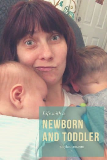 life with a newborn and toddler overlaid by Amy holding newborn and toddler
