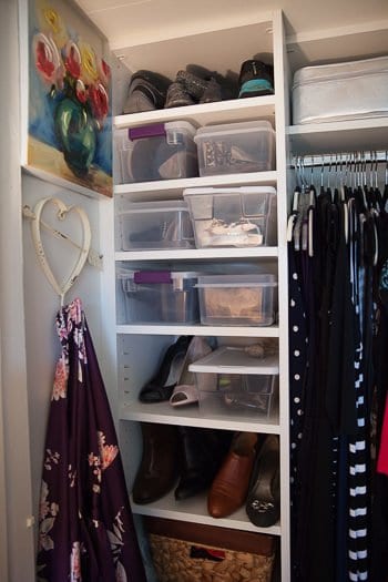 DIY Closet Organization shelves with plastic storage bins 