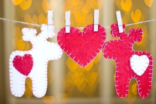 handmade felt Christmas ornaments of a heart and reindeer