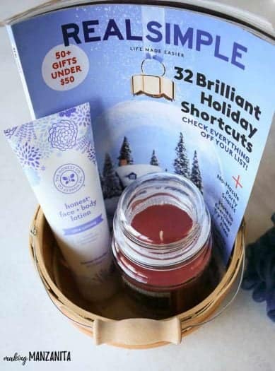 relaxation gift basket with magazine lotion and a candle