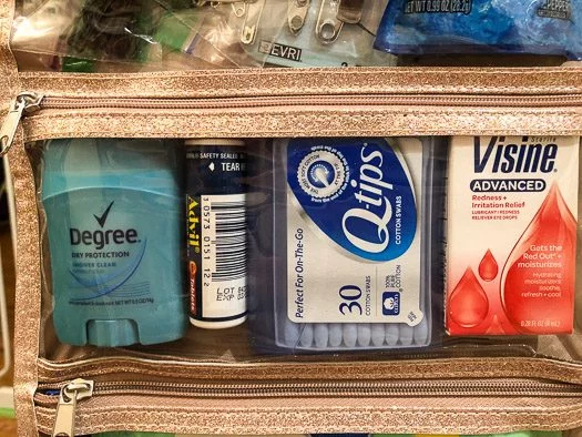 wedding day emergency kit close up with pain reliever, q-tips, eye drops