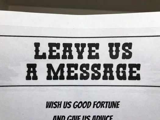paper that says "leave us a message"