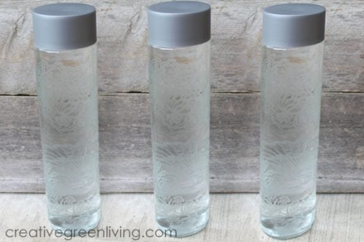 3 clear glass water bottles etched with flower pattern on it  creativegreenliving.com