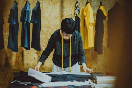 woman sewing clothes