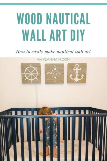Wood Nautical Wall Art DIY Pinterest Image, Three square wood pieces, each with a different picture. Wheel of a ship, compass, and an anchor, hanging over a blue crib with baby inside.