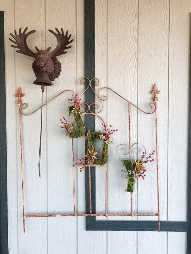 old rod iron fence with joy on it 