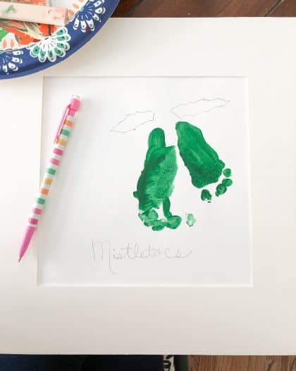 Green Color painting of toddler feet