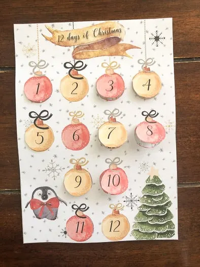 card with 12 ornaments on it