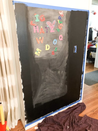 magnetic chalkboard with alphabet letters on it 