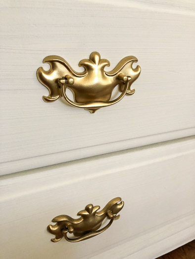 Close up of gold spray painted handles