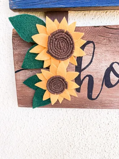 Felt Sunflowers on a brown sign