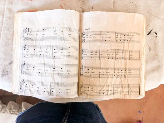 music pages glued into book