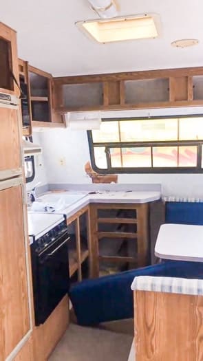 Kitchen area with all the cabinets taken off.