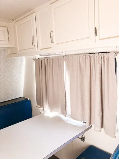 drop cloth curtain over dinette