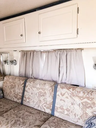 drop cloth curtain behind couch