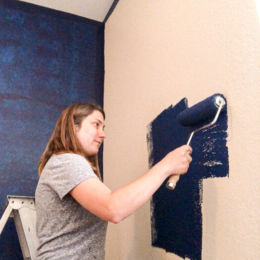 Me painting the walls blue