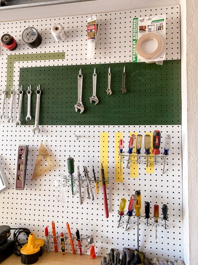 Tools hanging on a pegboard