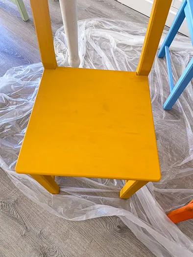 yellow chair seat after 3 coats, showing minimal stains