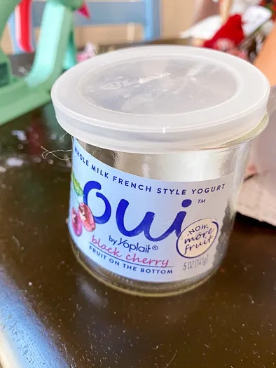 empty oui jar with a clear lid